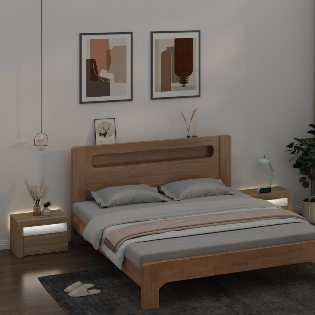 Noćni ormarići 2 kom s LED svjetlima boja hrasta 60x35x40 cm