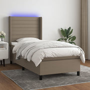 Krevet box spring s madracem LED smeđesivi 90x200 cm tkanina