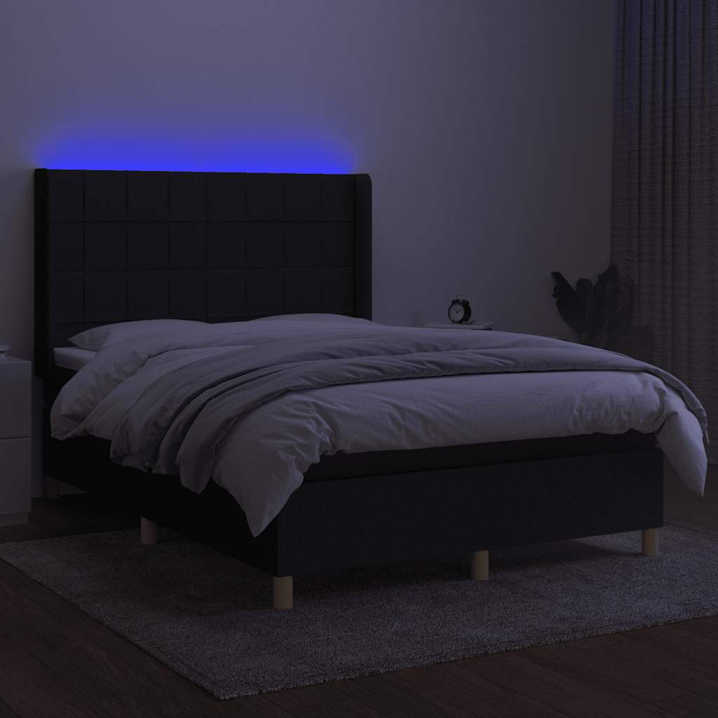 Krevet box spring s madracem LED crni 140x200 cm od tkanine
