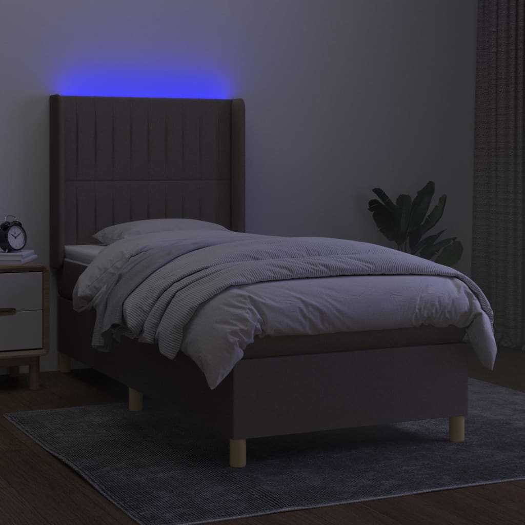 Krevet box spring s madracem LED smeđesivi 90x200 cm tkanina