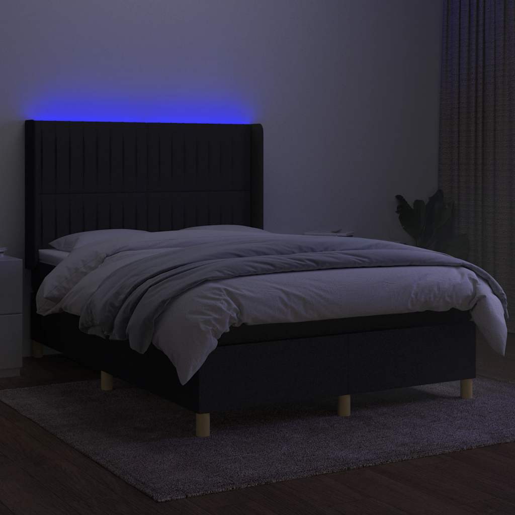 Krevet box spring s madracem LED crni 140x190 cm od tkanine