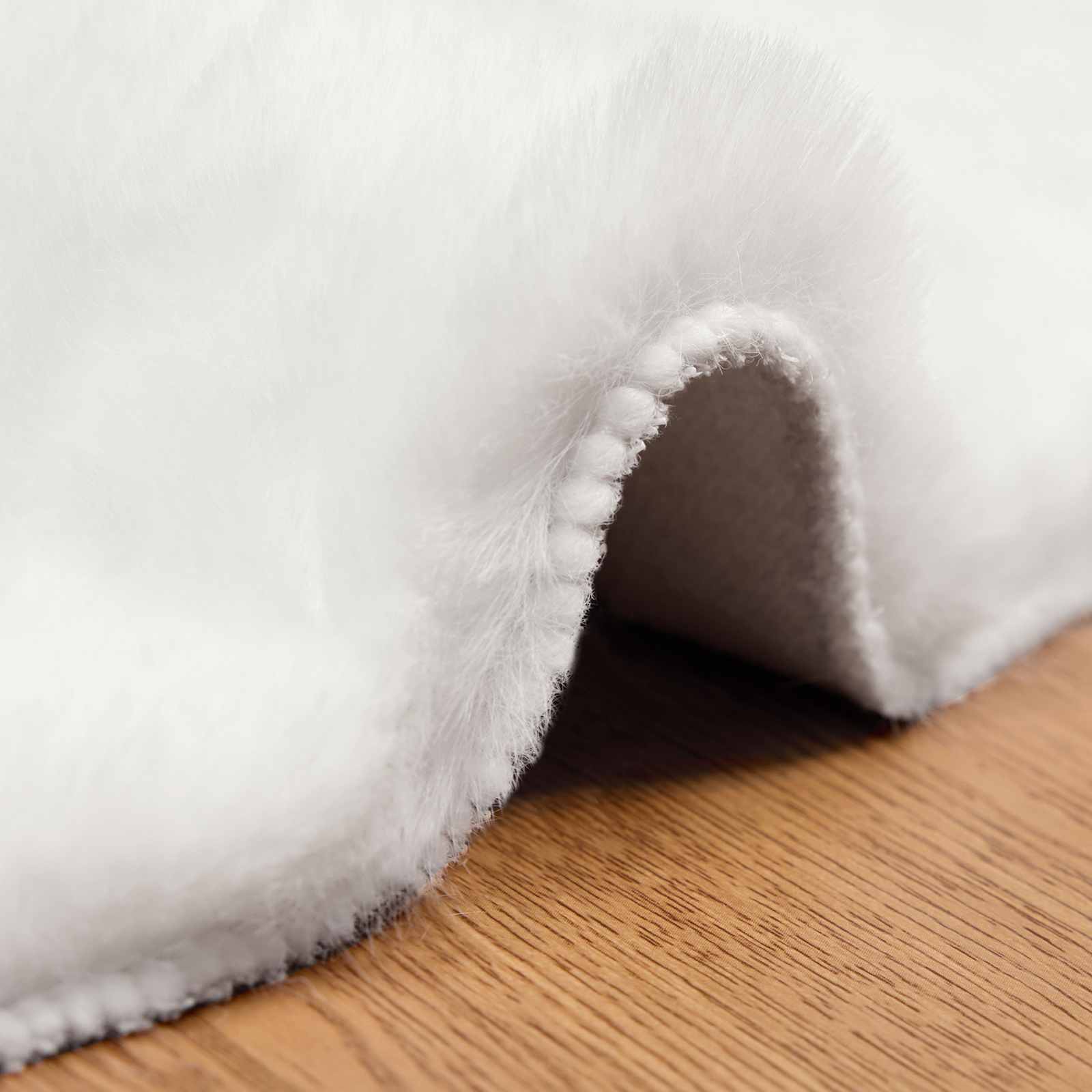 Protuklizni tepih od umjetnog zečjeg krzna OLITE Bijela Ø 80 cm